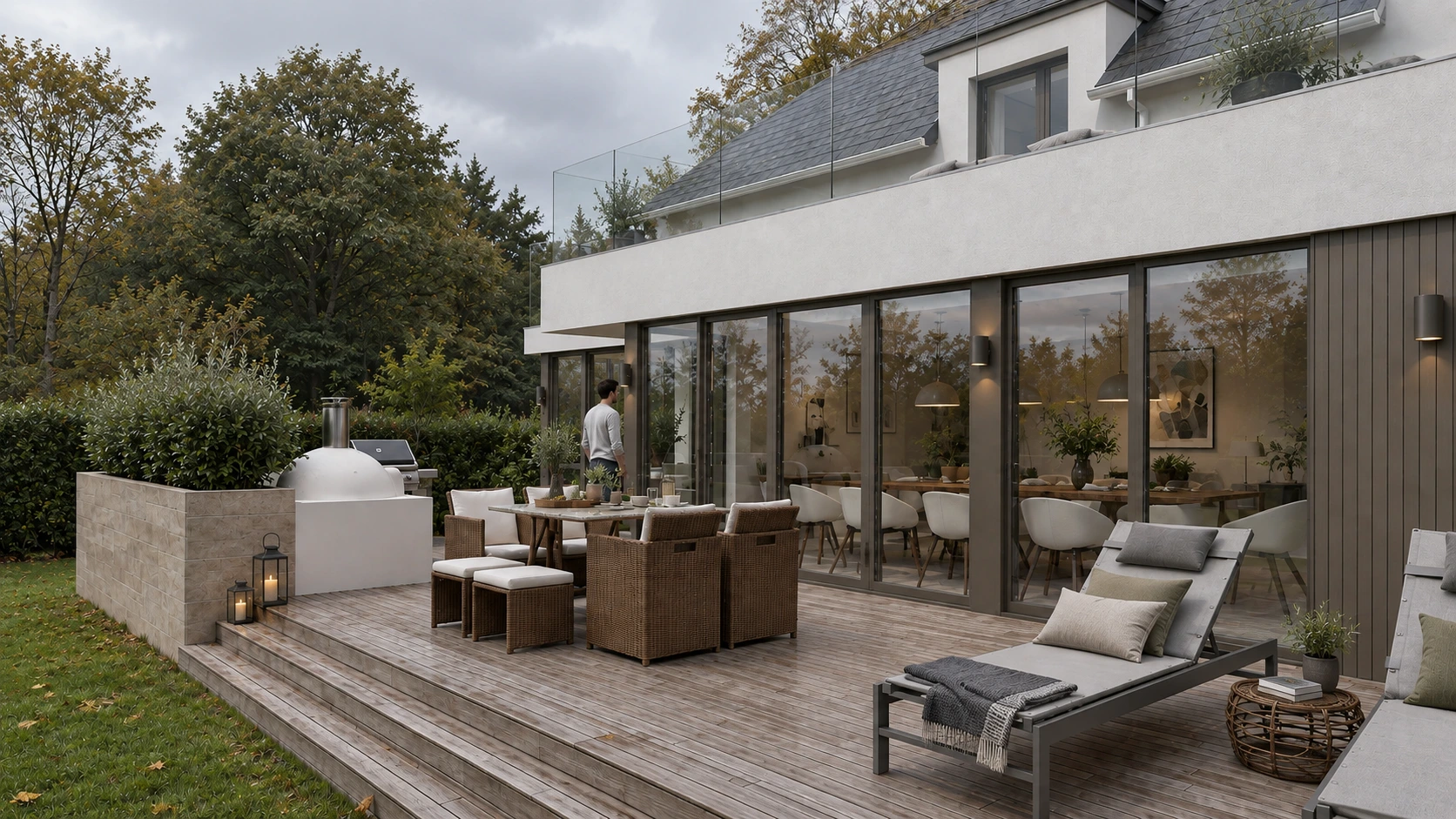 Contemporary rear extension with glazed walls, timber terrace, outdoor dining area and mature landscaped garden