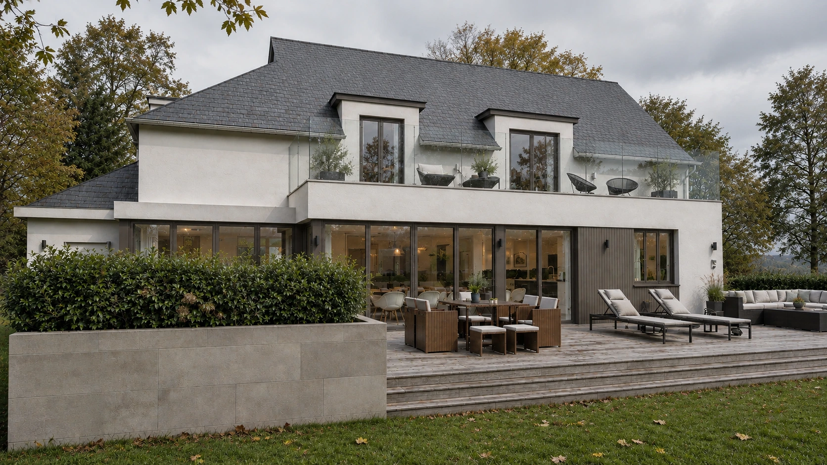 Contemporary rear extension with full-height glazing, timber terrace, landscaped garden and mature planting