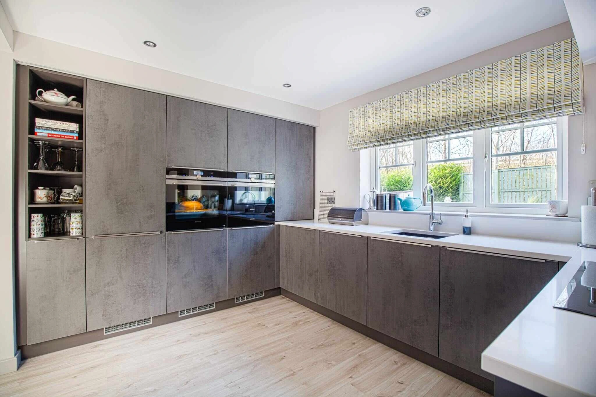 Open-plan contemporary kitchen within an extended family home in Newton Mearns