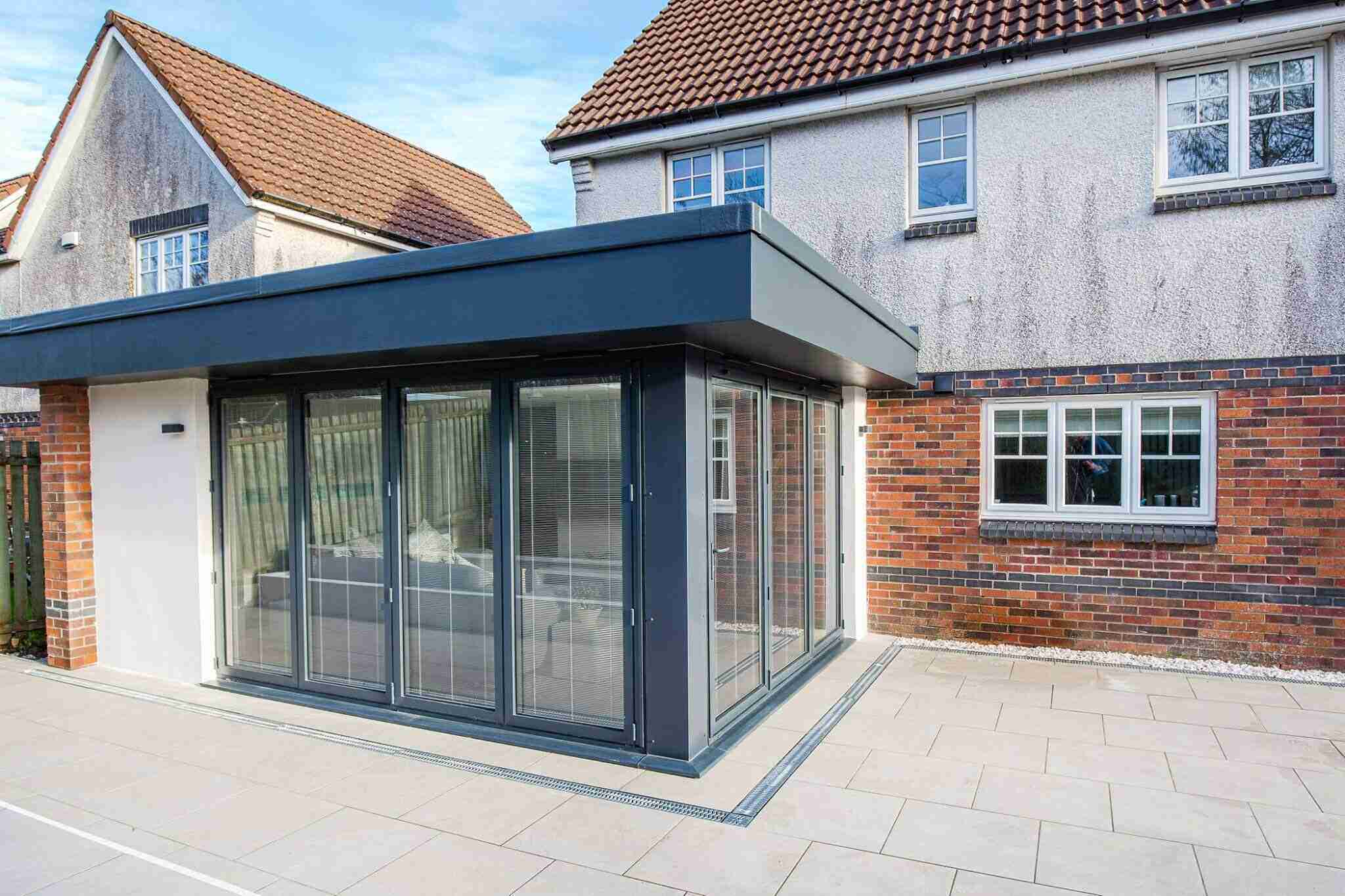 Contemporary extension creating a stronger connection between the family home and garden in Newton Mearns