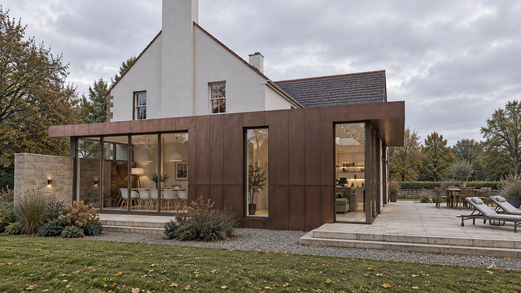 Side elevation showing a modern copper-clad extension carefully integrated with the traditional house