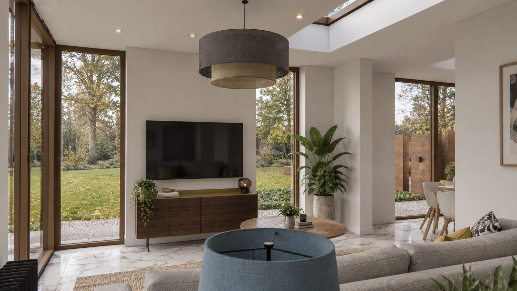 Light-filled kitchen extension with large rooflights, timber-framed glazing and bespoke kitchen cabinetry