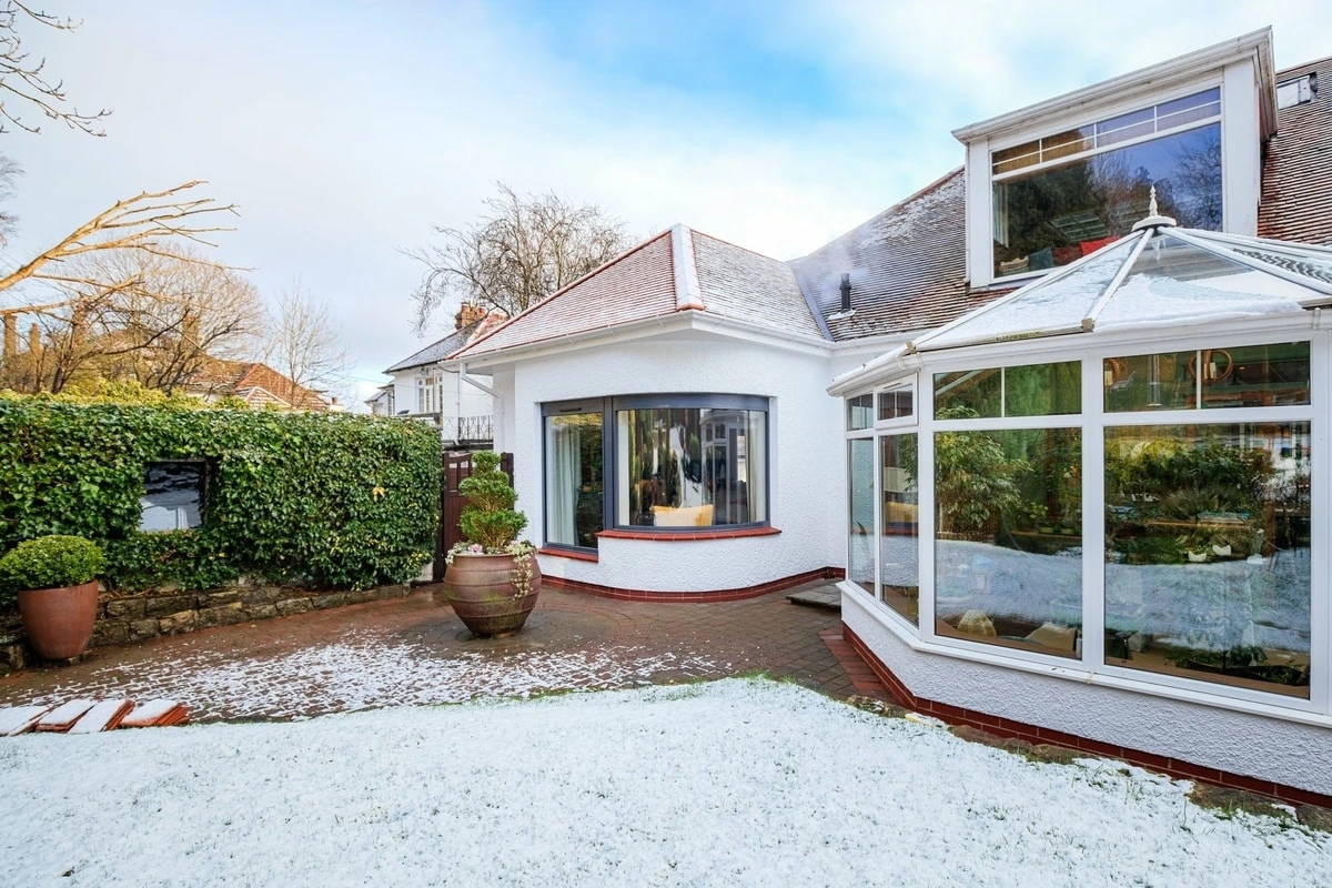Extended living space connected to the garden of a Giffnock family home