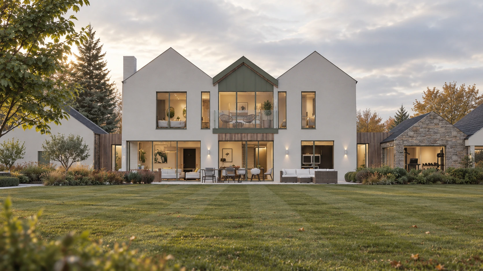 Contemporary West Lothian country house with large glazed openings and covered terrace overlooking the garden